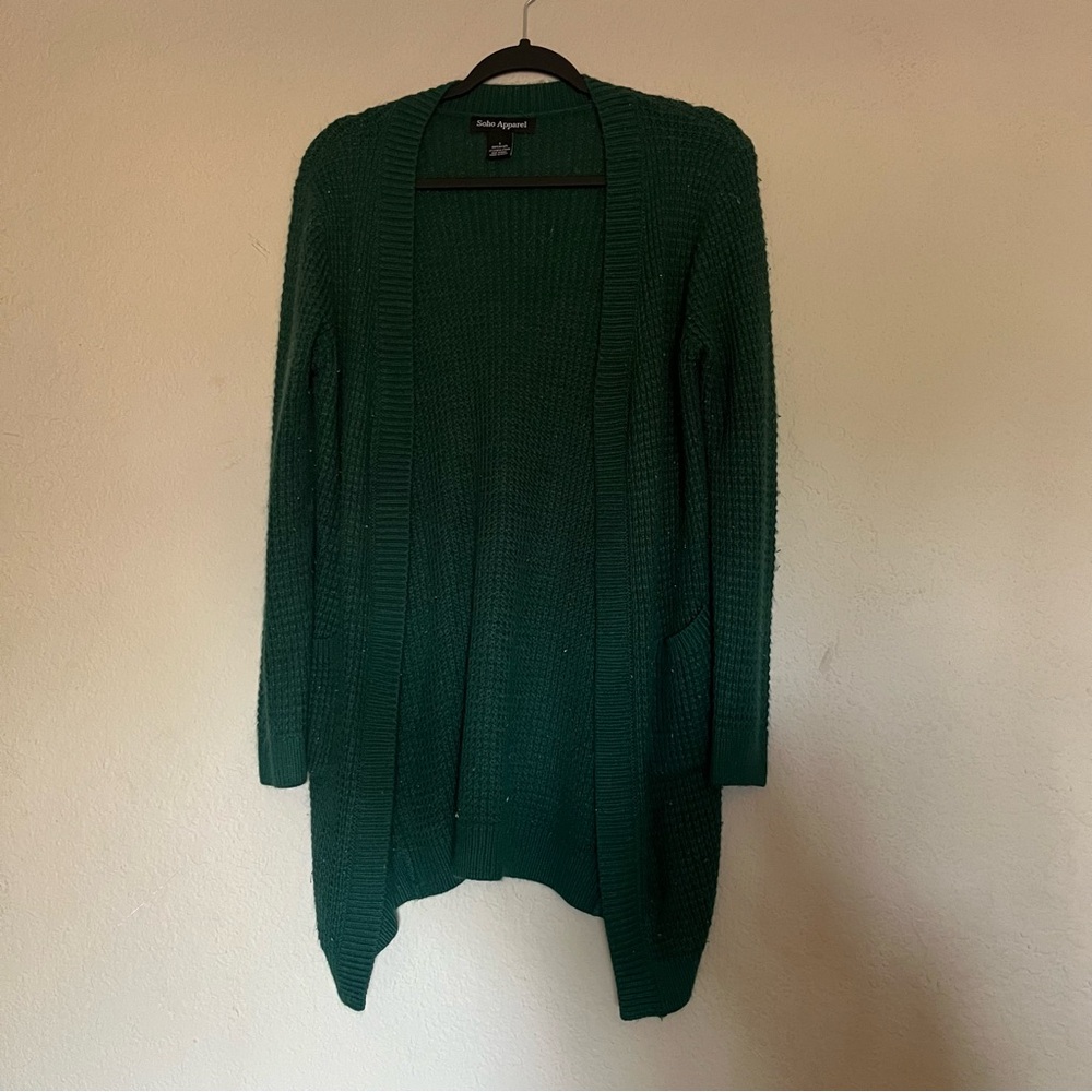 dark green knitted cardigan with pockets